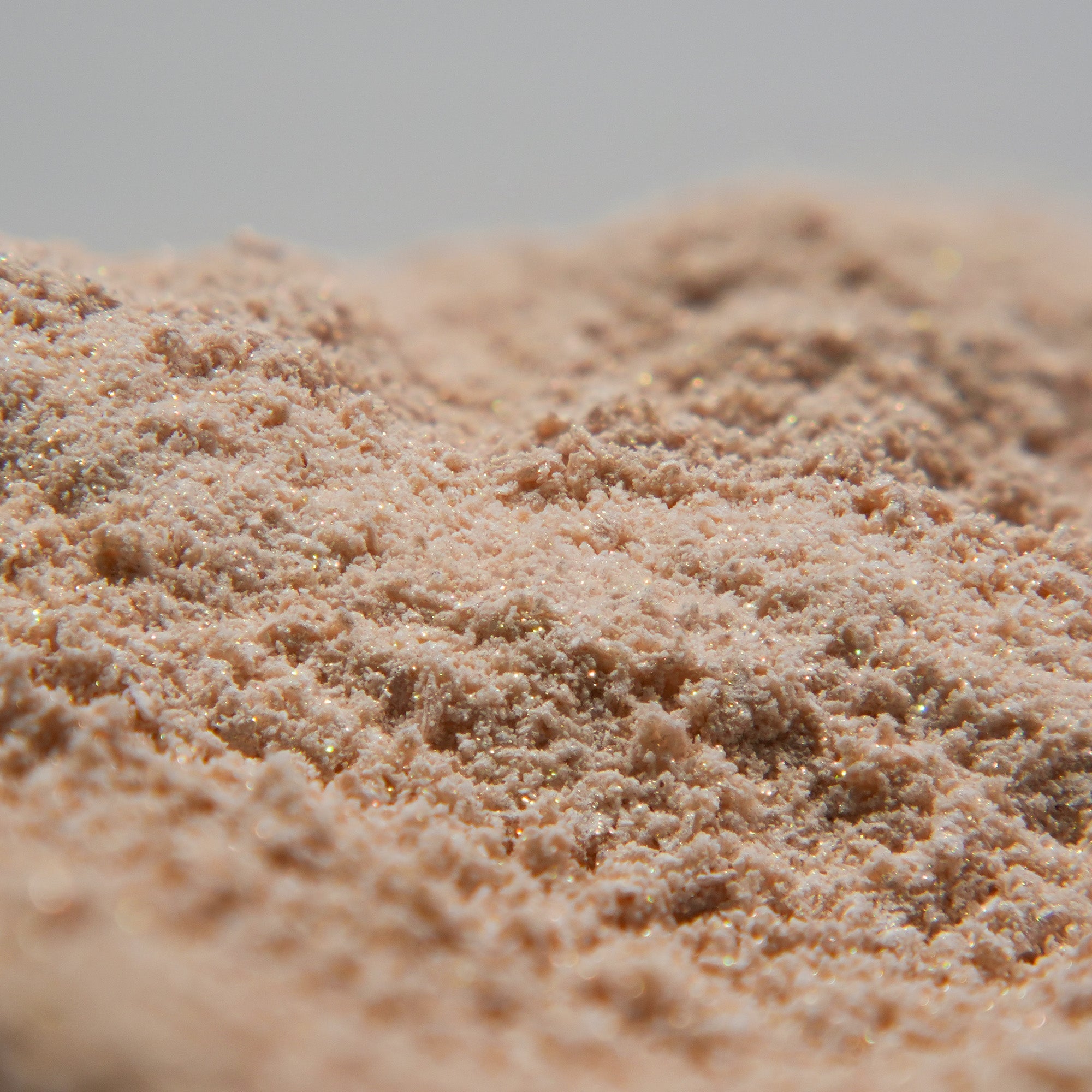 Close-up of honey jelly mask powder texture with a blurred background
